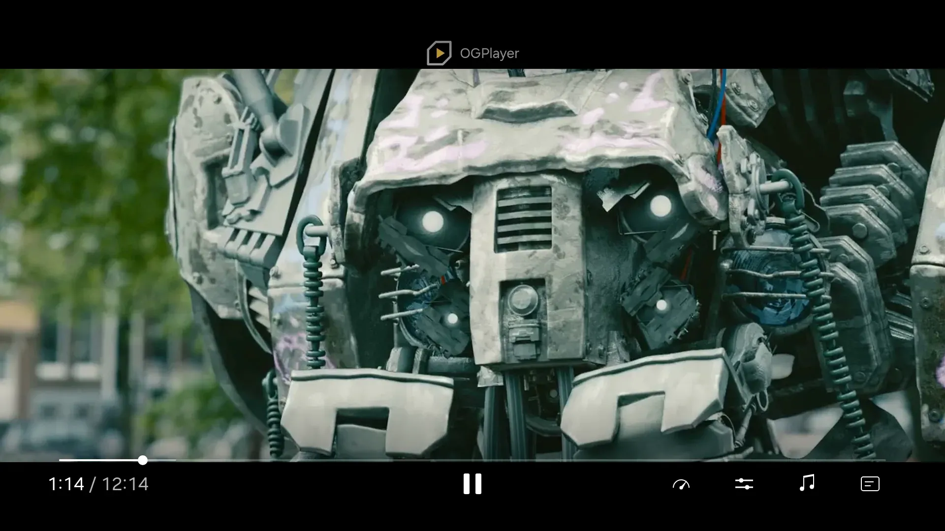 The remote-control chrome on a Samsung set: scrub bar, play/pause centred in the bottom row, option buttons on the right.